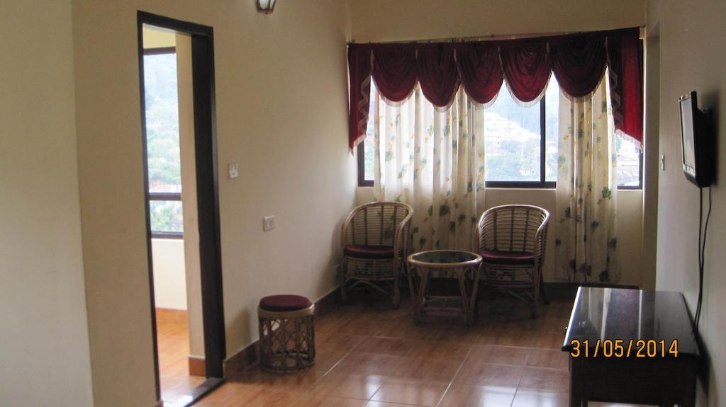 Poopada Hotel Munnar Szoba fotó
